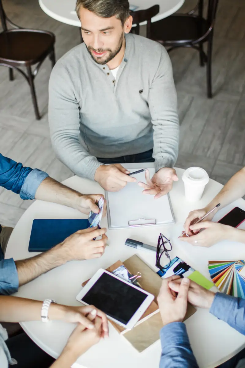 Creative designers sharing ideas during interaction Creative designers sharing ideas during interaction